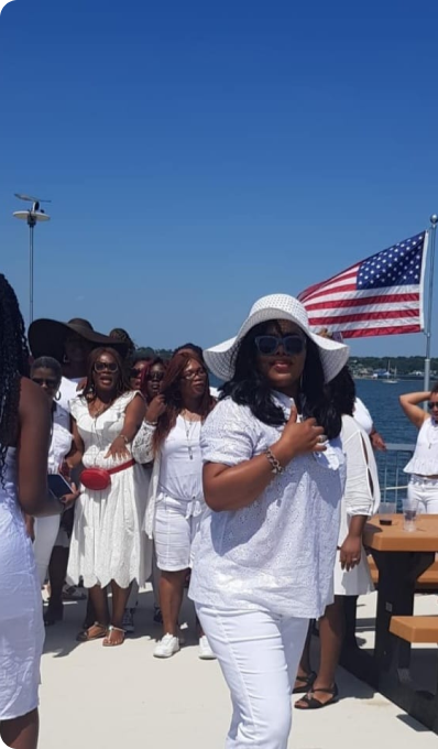 Diaspora community members at outdoor ceremony