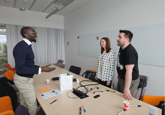 DCC office meeting with diverse team